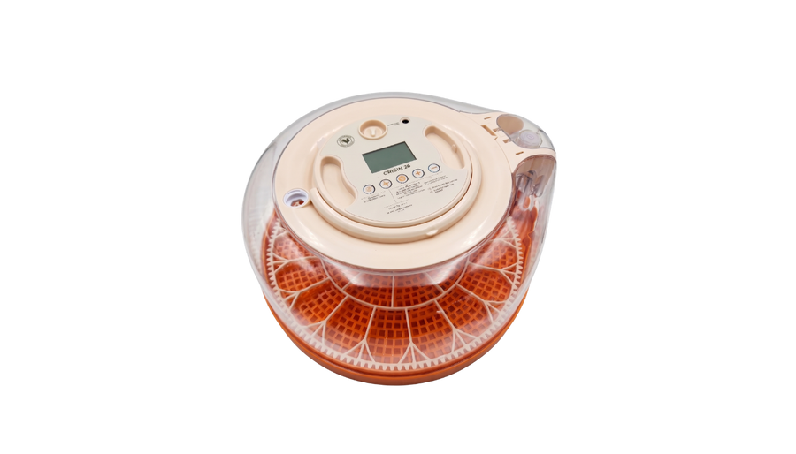 Origin 26 incubator with the lid off, showing the orange turning cradle and digital control panel