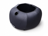 The black neoprene Nurture Right 360 insulation cover off the incubator, showing its moulded shape and port opening.