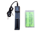 Battery charger with green batteries on a white background