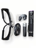 Flat lay of the Origin UV Candler with the included UV safety glasses, lanyard, USB charging cable and rechargeable battery.
