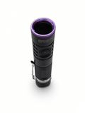 Origin UV Candler viewed from above, showing the purple UV bezel ring and Origin branding on the black anodised body.